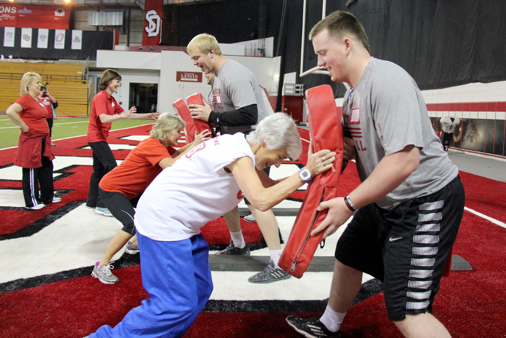 Women’s football clinic draws 80 to the DakotaDome