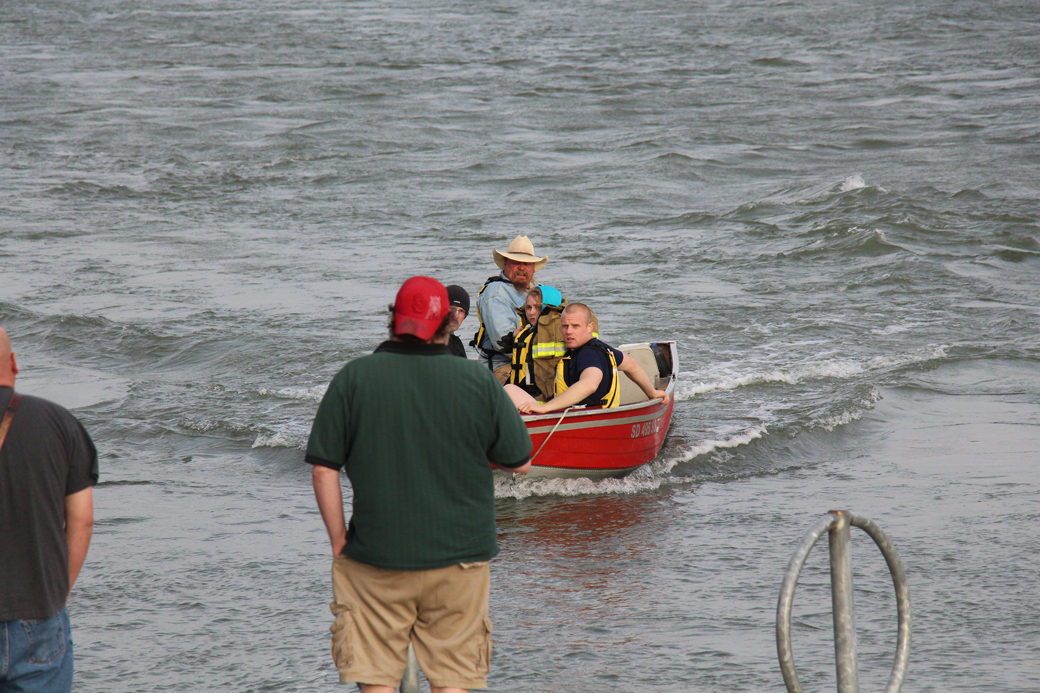 Emergency crews rescue two from capsized canoe