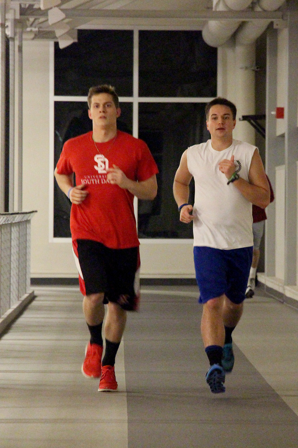 Roommates team up for charity marathon, fraternity challenge