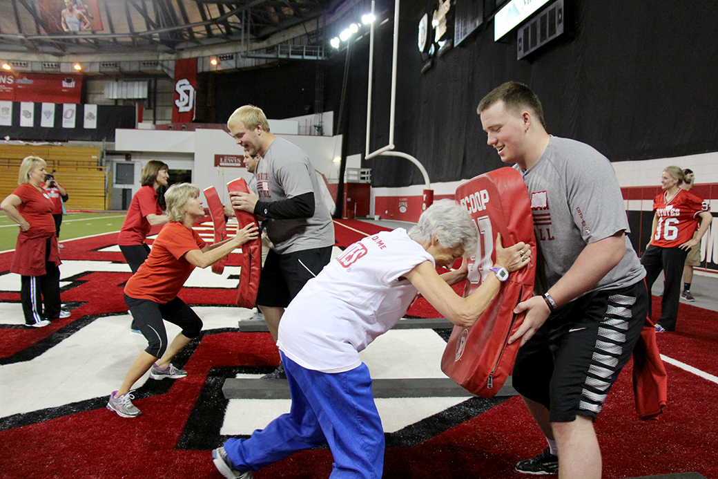 Clinic gives female fans inside look at USD football