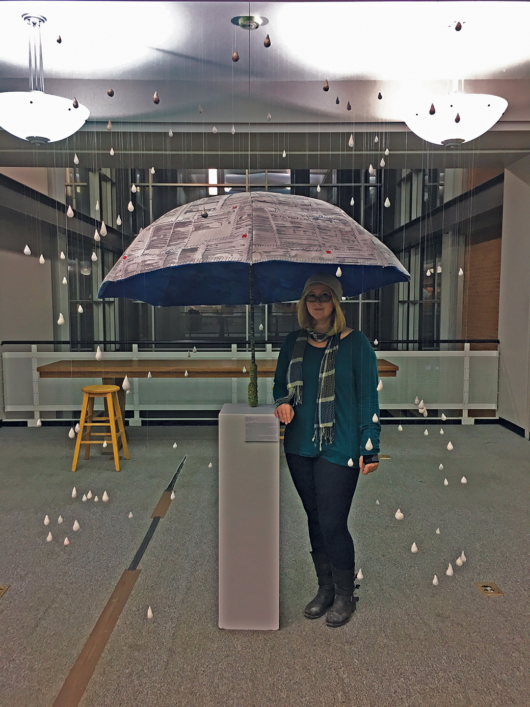 Graduate student finds inspiration in past for umbrella art display