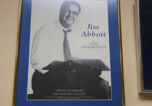 A campaign poster promoting James Abbott for State Representative hangs in Abbott’s office. He lost the election, but says his political defeats still led him to happiness at as USD’s president. Malachi Petersen / The Volante