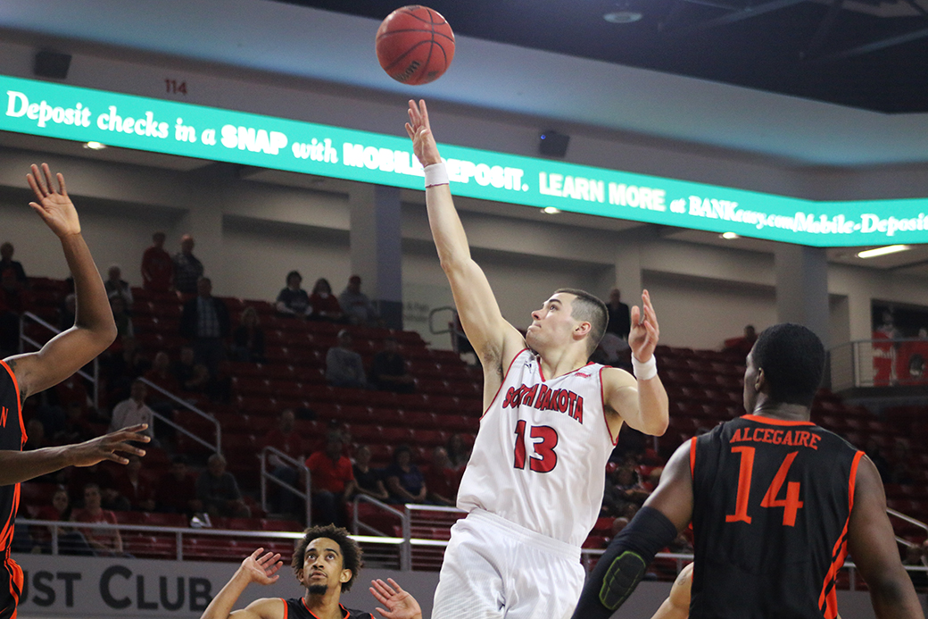 Coyote men win first game in Sanford Coyote Sports Center