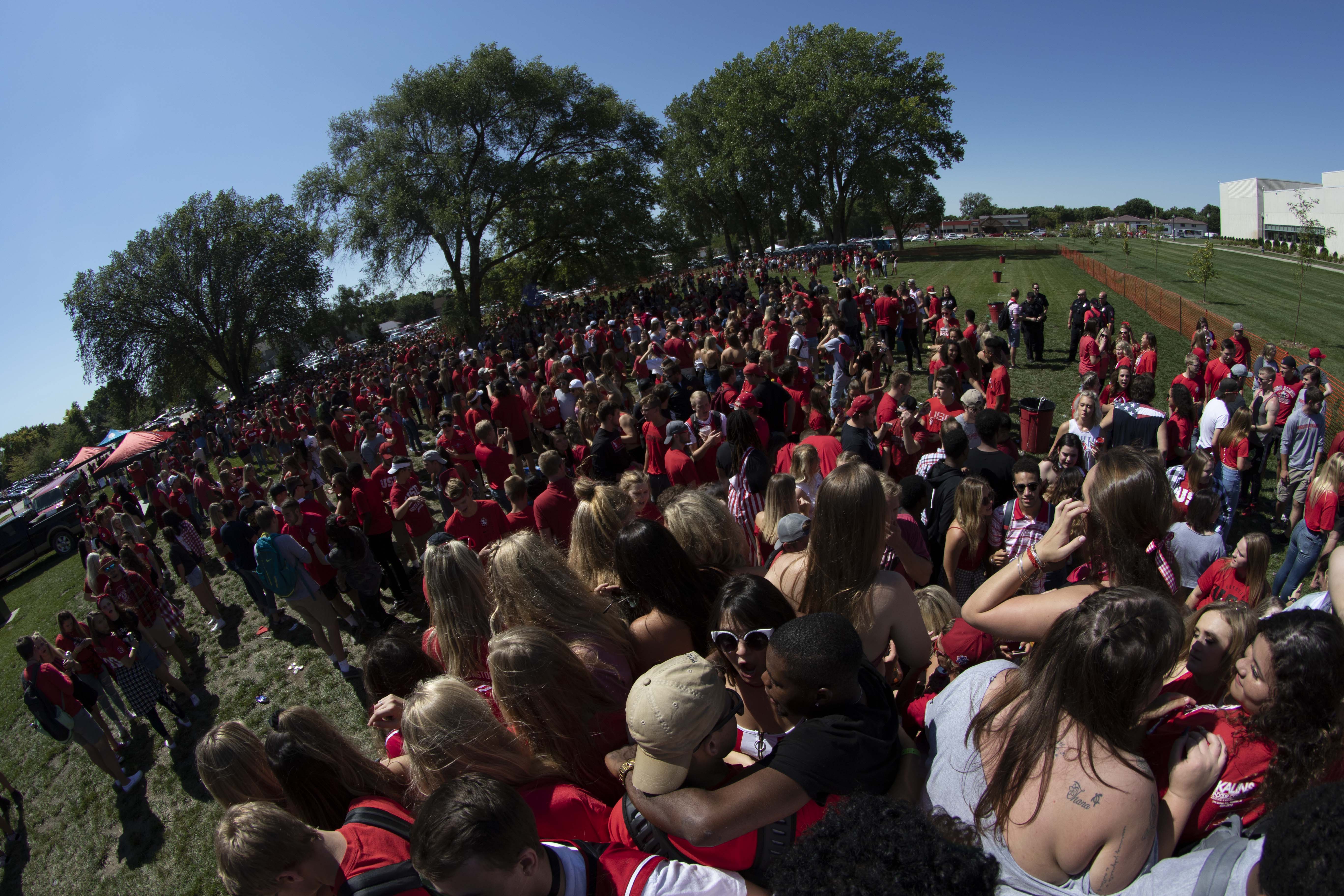 Students react to season’s first tailgate in new area
