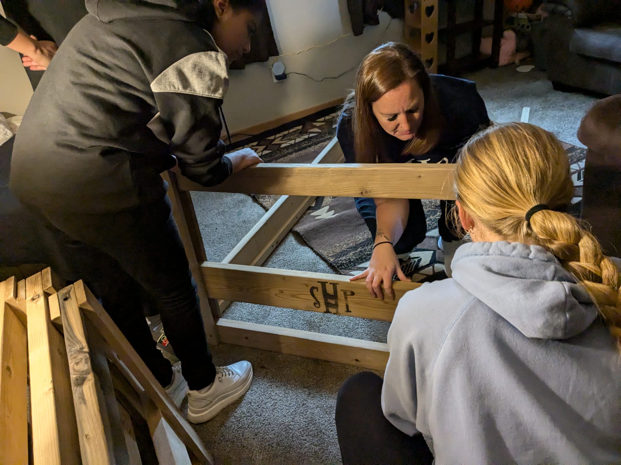 Building Beds and Building Community: Students Help Families in Need